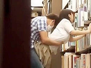 2117315 - School Girls In Books Shop