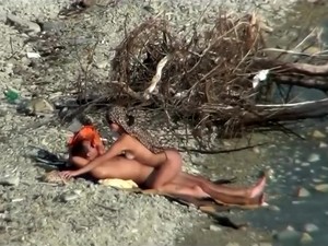 Lazy Guy Cums Into A Girlfriend's Pussy On The Nudist Beach