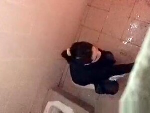 Asian Woman Spied Over The Toilet Wall Taking A Pee