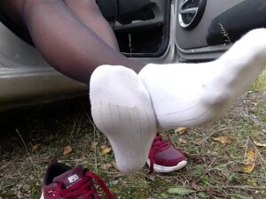 Sexy Girl In Stockings Shows Her Legs And Wears Dress White Socks Feet Foot Fetish