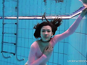 Leggy Girl Goes Swimming In Her Leotard