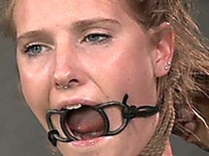 Blonde Slave With A Ring Gag In Her Mouth Is Bounded And Punished