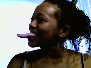 Damn! That Ebony Webcam Babe Has A Very Long Tongue!