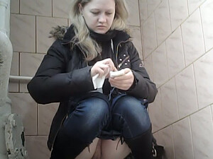 Sweet Pale Skin Blonde Teen In Blue Jeans Urinates In The Toilet