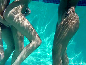 Two Hotties In Bikinis Fuck A Guy In And Out Of The Pool