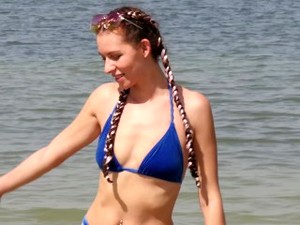 This Girl Doesn't Know Her Nipple Is Hanging Out Of Her Bikini Top